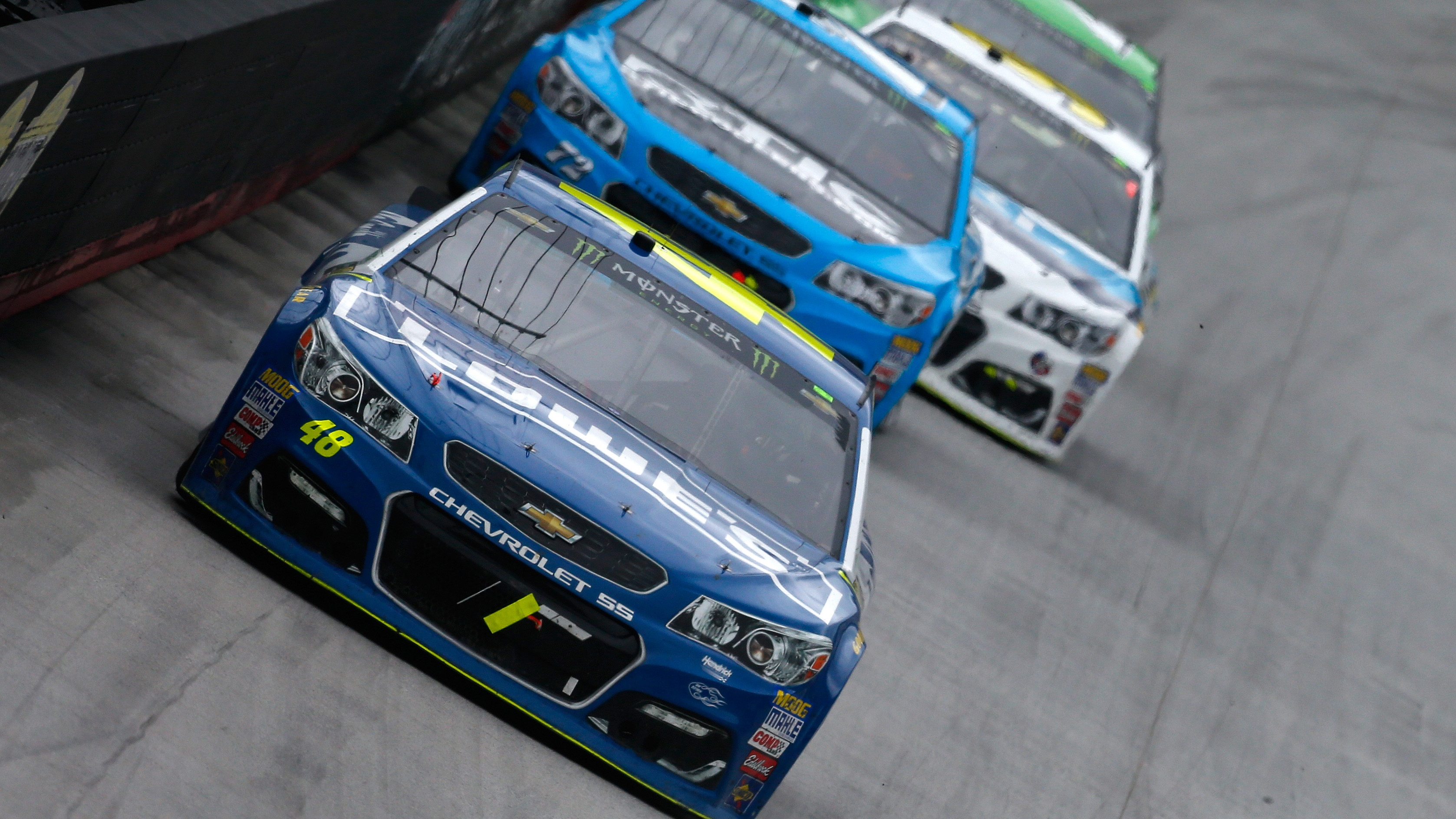 BRISTOL, TN - APRIL 24: Jimmie Johnson, driver of the #48 Lowe's Chevrolet, leads a pack of cars during the Monster Energy NASCAR Cup Series Food City 500 at Bristol Motor Speedway on April 24, 2017 in Bristol, Tennessee. (Photo by Sean Gardner/Getty Images)
