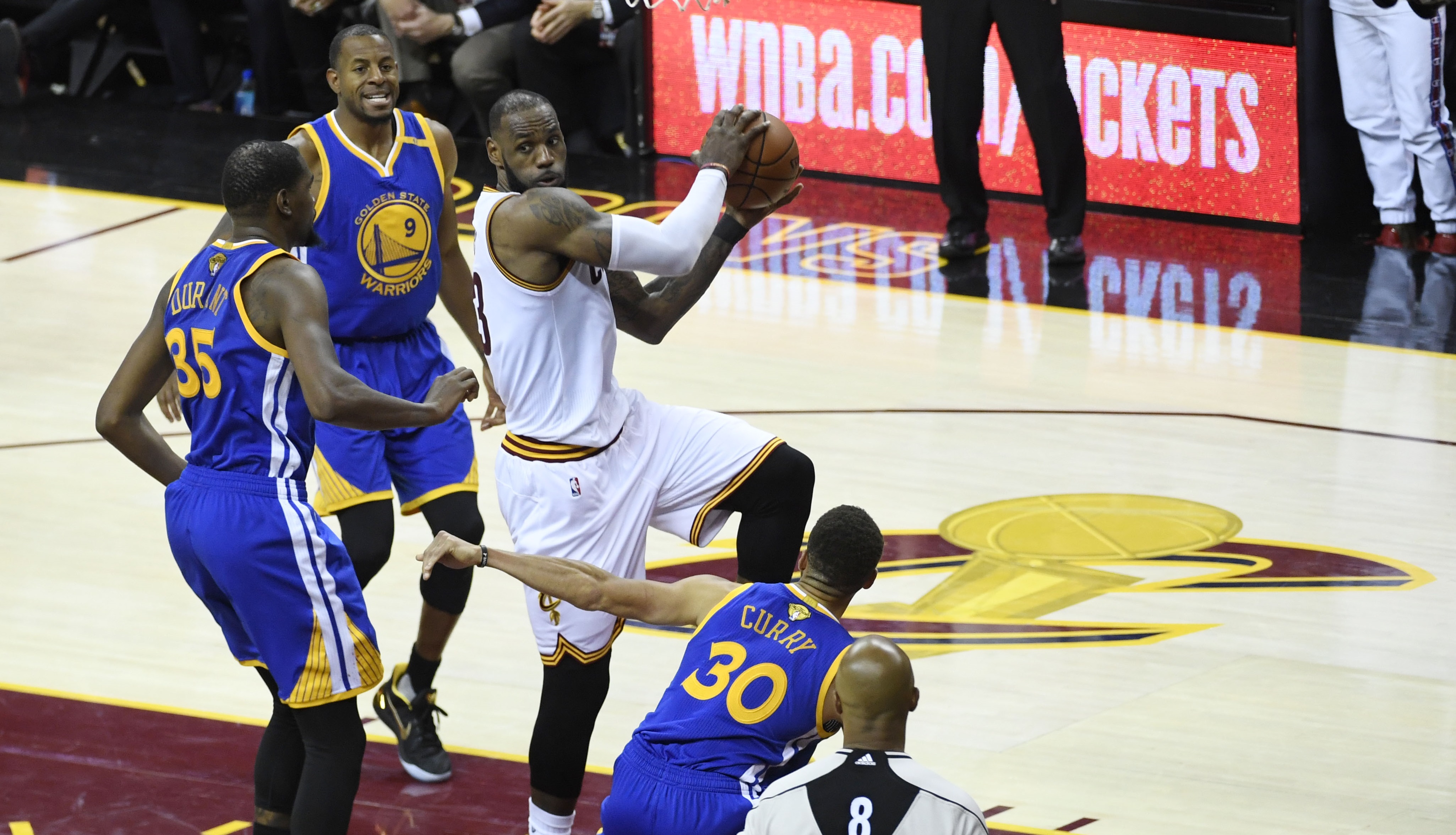 Jun 9, 2017; Cleveland, OH, USA; Cleveland Cavaliers forward LeBron James (23) drives to the basket against Golden State Warriors forward Kevin Durant (35) and guard Stephen Curry (30) during the second half in game four of the 2017 NBA Finals at Quicken Loans Arena. Mandatory Credit: Kyle Terada-USA TODAY Sports