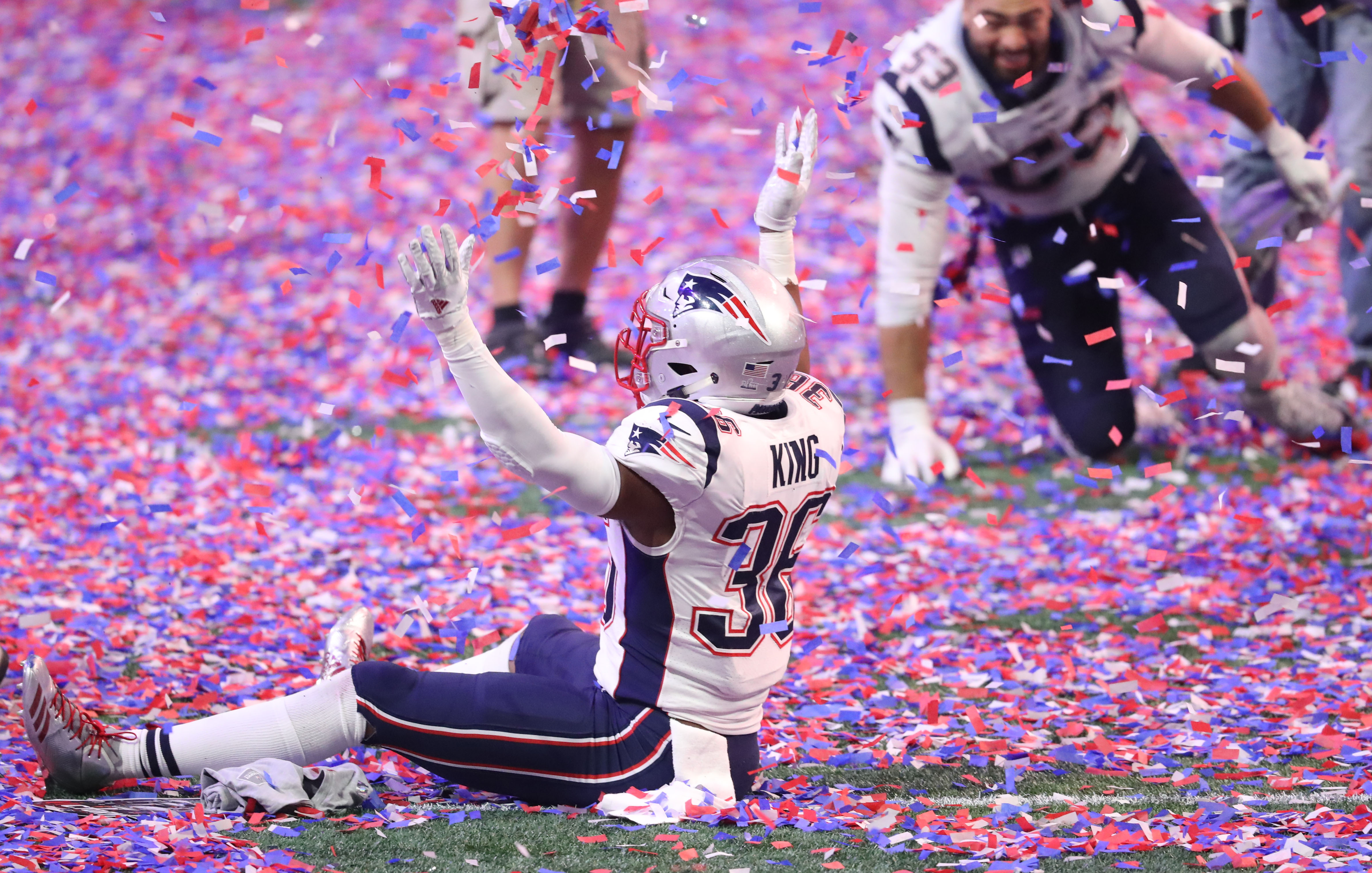 Feb 3, 2019; Atlanta, GA, USA; New England Patriots linebacker Brandon King (36) plays in confetti after defeating the Los Angeles Rams in Super Bowl LIII at Mercedes-Benz Stadium. Mandatory Credit: Jason Getz-USA TODAY Sports